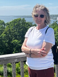 The love of my life standing on the balcony with the most obscured view of the lake available… I was trying to make the light right and lost view of the lake as is available from a slightly different angle !