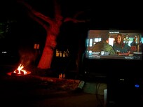 We brought a movie screen
The couple next door who we just met enjoyed tje movie and outdoor time