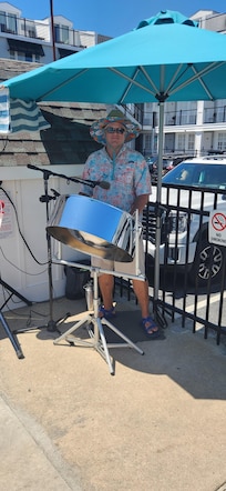 Steel drum at poolside.