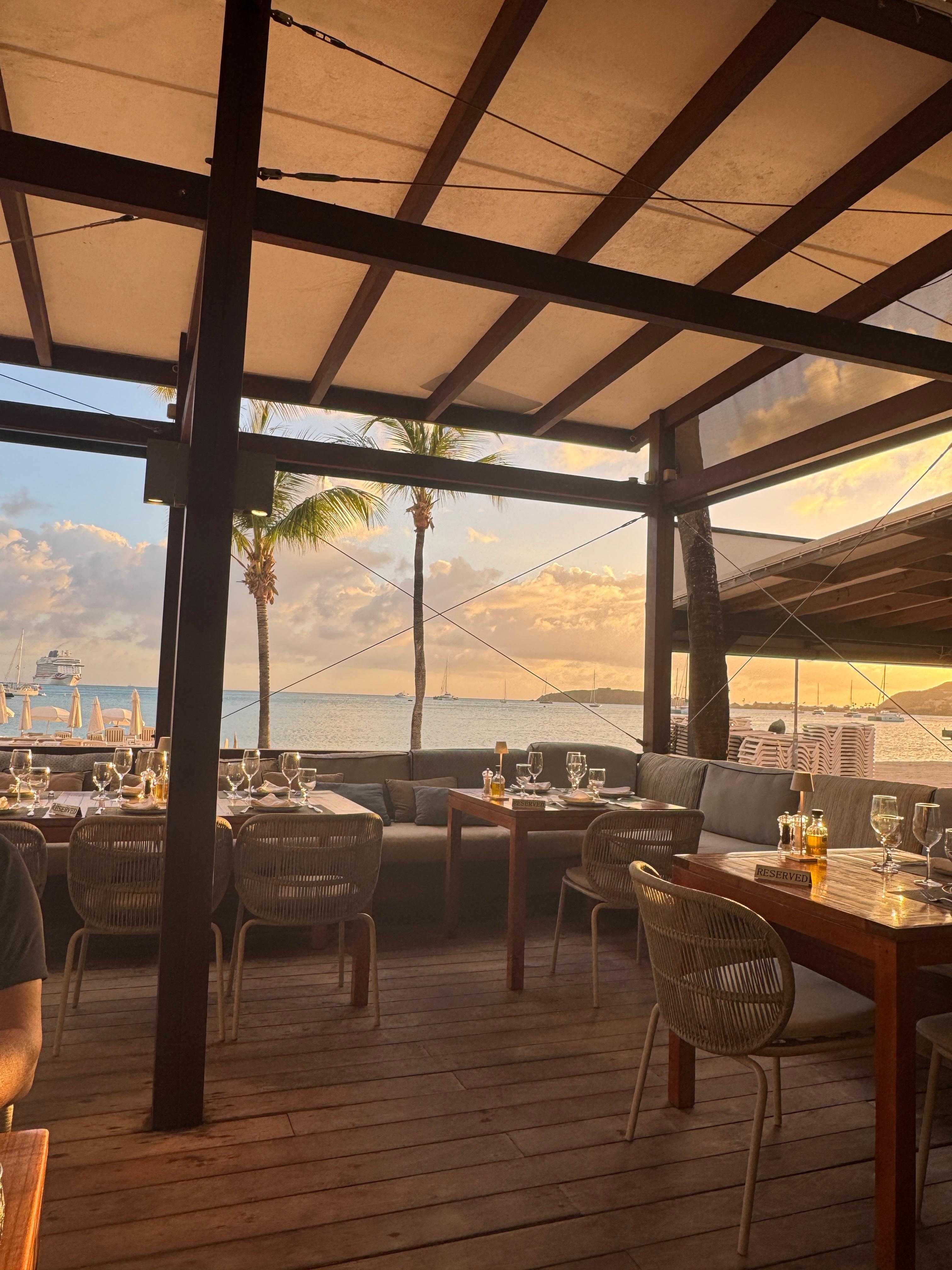 Resturant for breakfast lunch and dinner overlooking the beach and bay . 