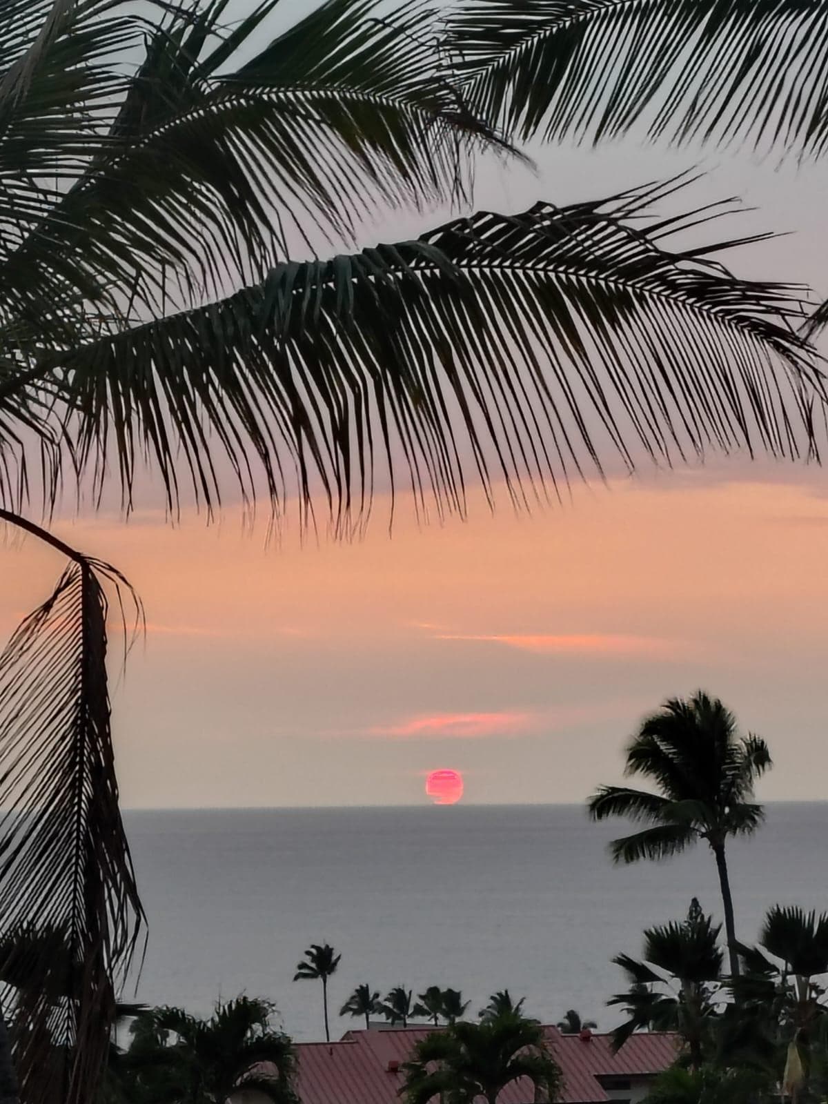 Foto del atardecer del balcón de la habitacion