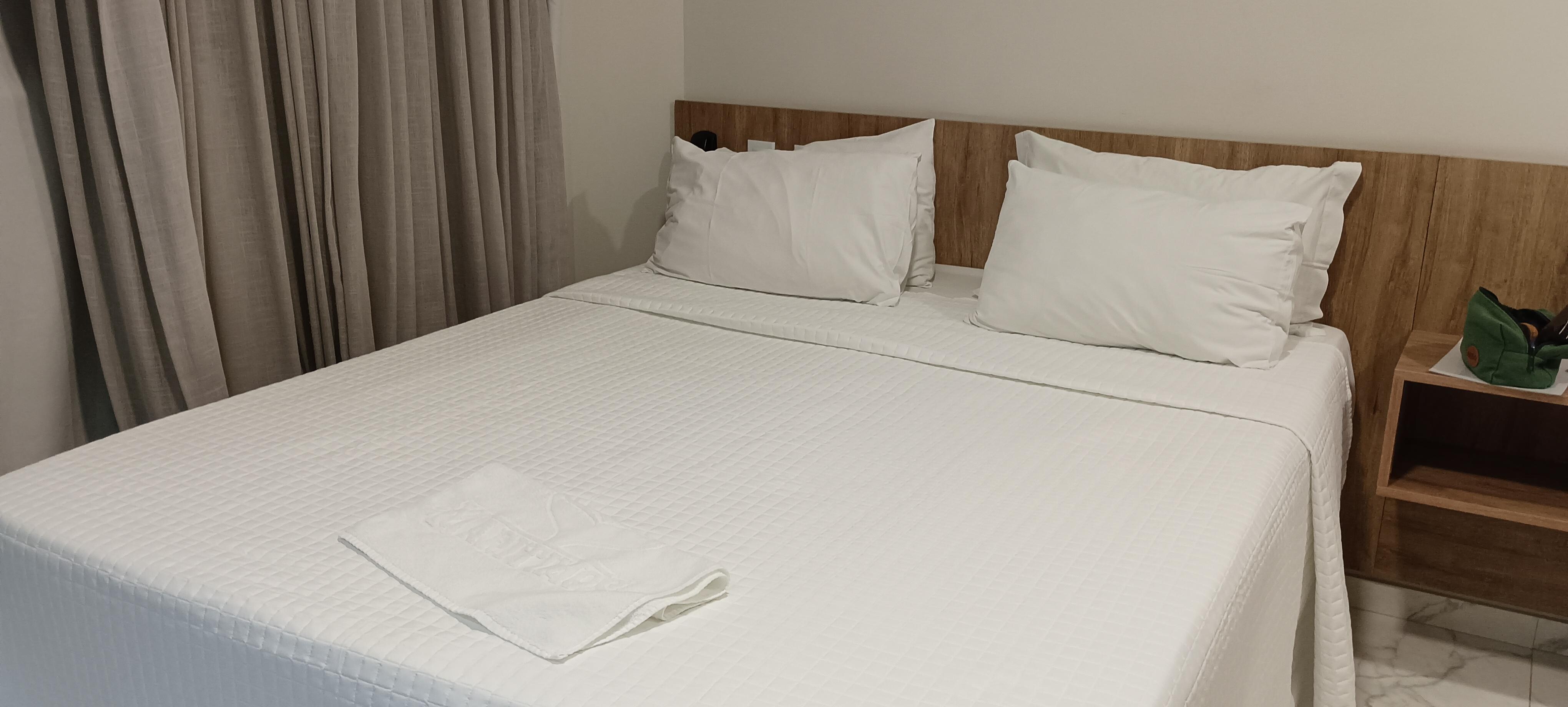 Quarto bem espaçoso 