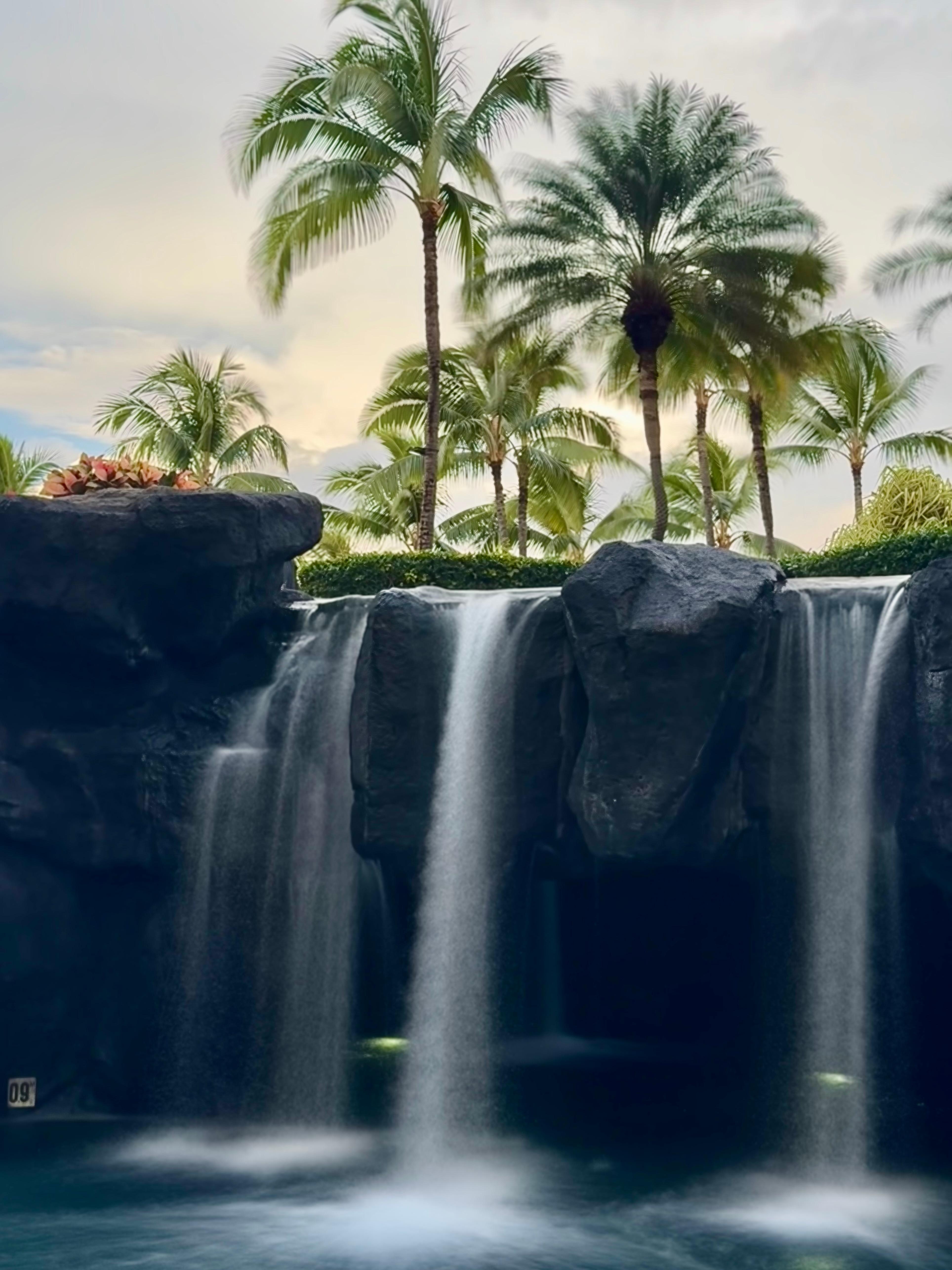 Fun waterfalls to swim under in the pool.