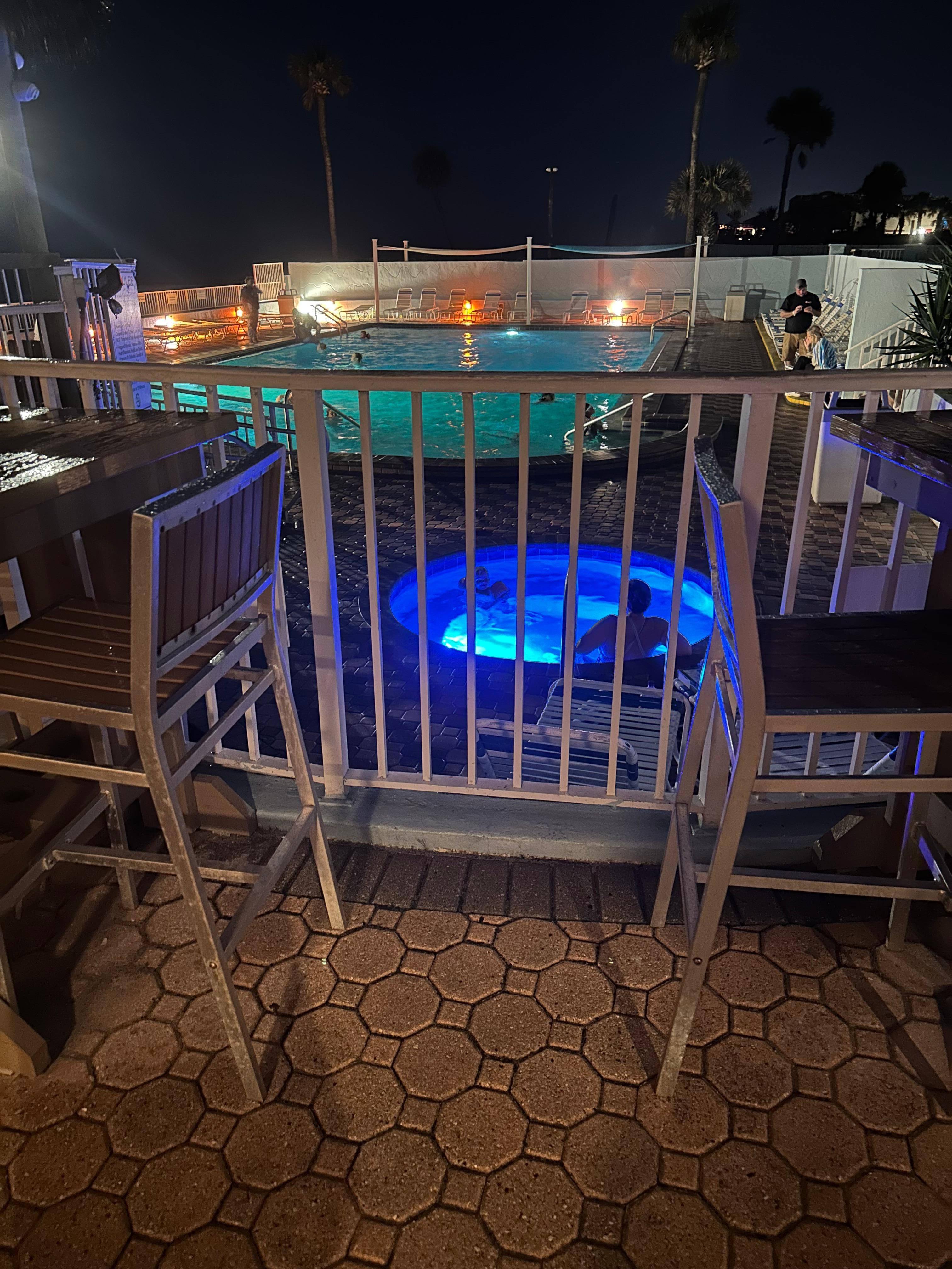 Pool and hot tub view from the tiki bar