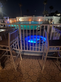 Pool and hot tub view from the tiki bar