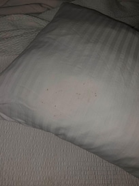 Stains or dirt on pillow