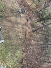 Garbage out back. I witnessed the cleaners throwing garbage too while cleaning the other cabin.