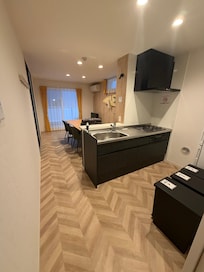 Kitchen and dining (fridge is in front of cooking area)