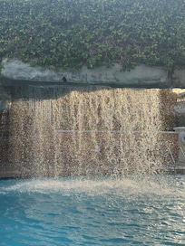 Piscina com cascata climatizada