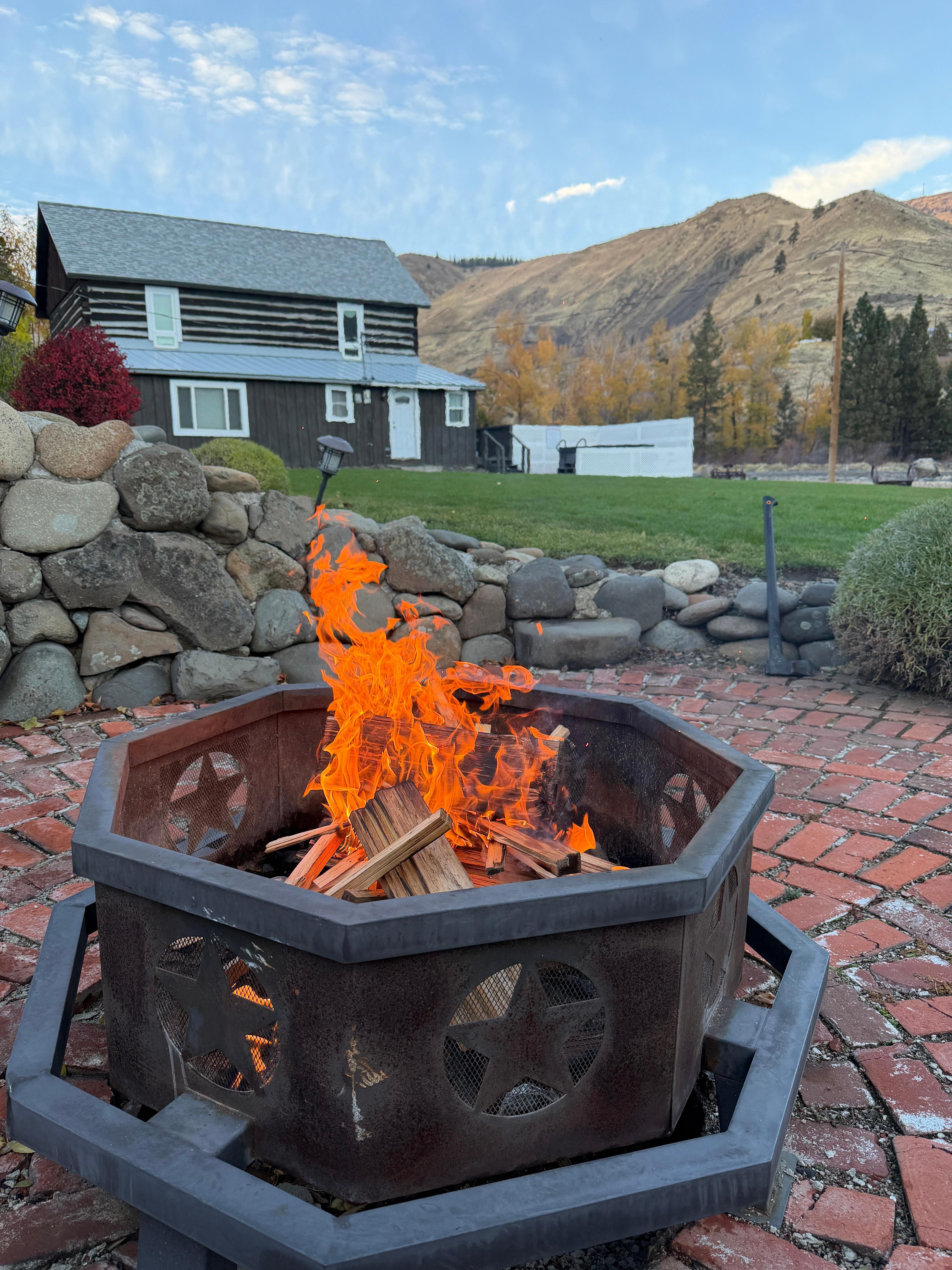Lovely fire pit outside the cabin