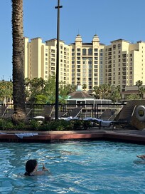 One of the pools and one of the buildings on property across the way
