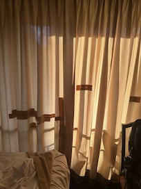 The curtain has been taped from the outside so it can’t be seen directly from the inside of the room.