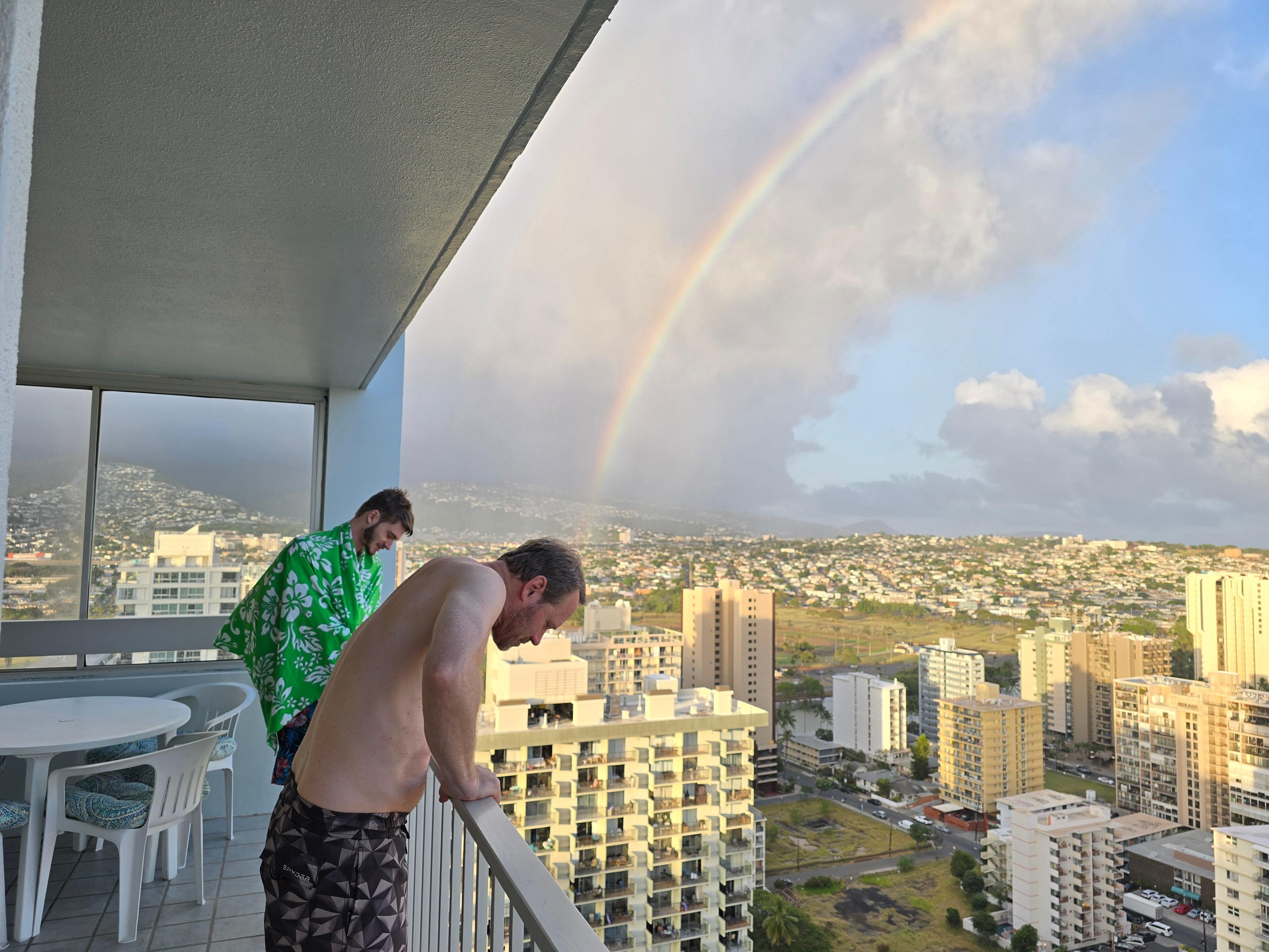 City & mountain views from balcony.