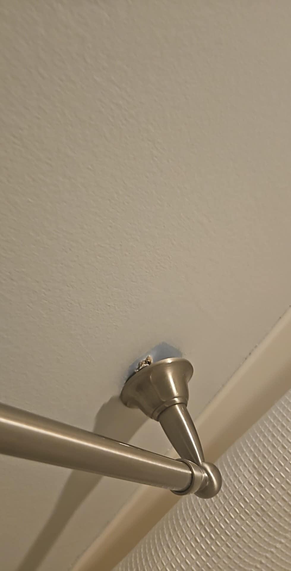 The towel rack was coming out the wall and they told us just put it under the sink 