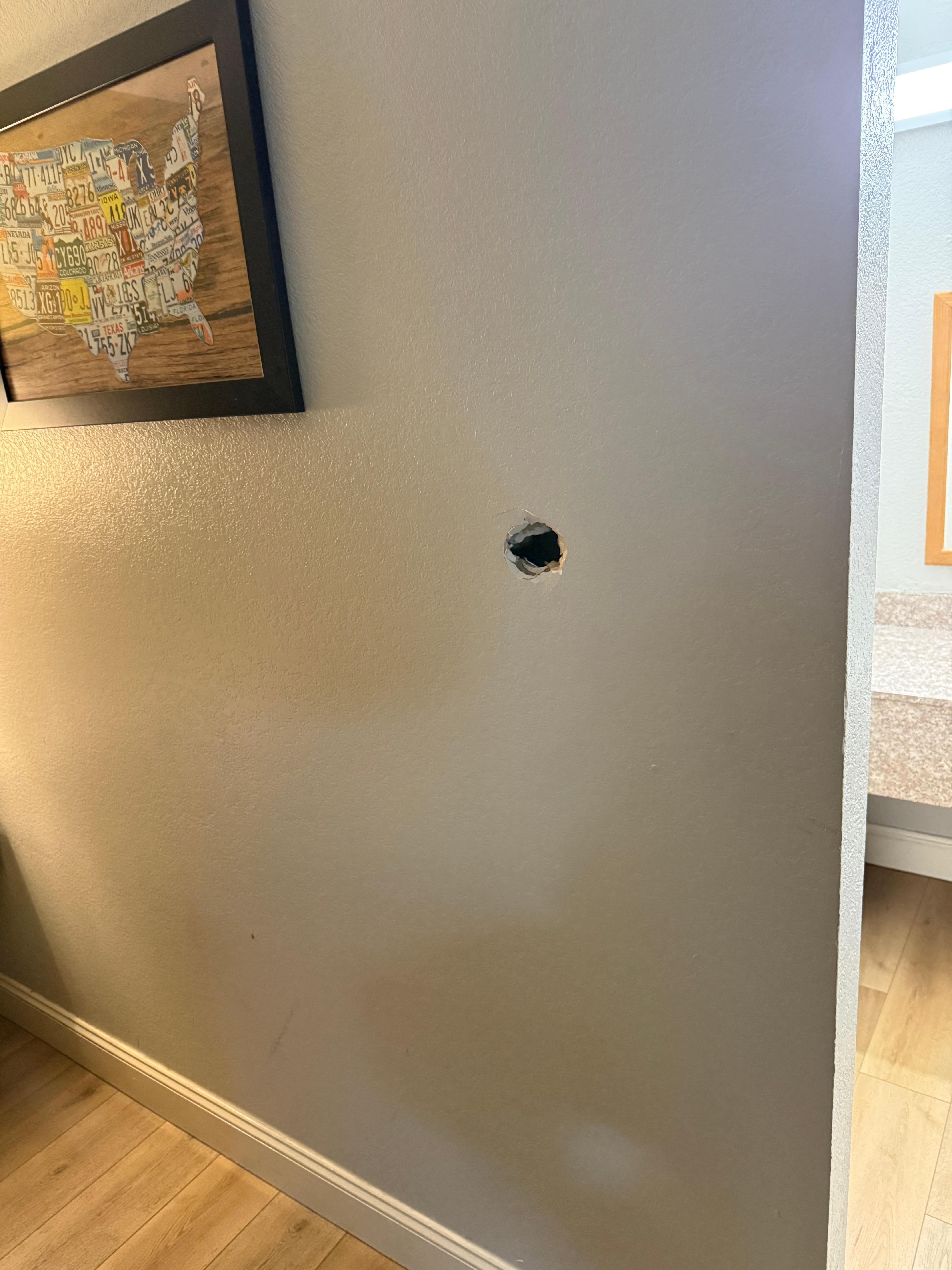 Large hole in wall 