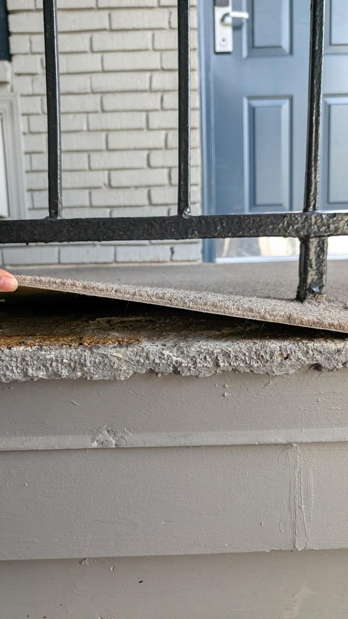 Floor tiles not properly adhered to floor