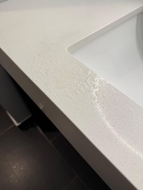 Water in sink from leak