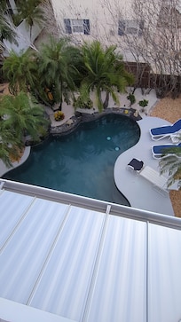 From 3rd floor rooftop lookout. Looking down at pool.