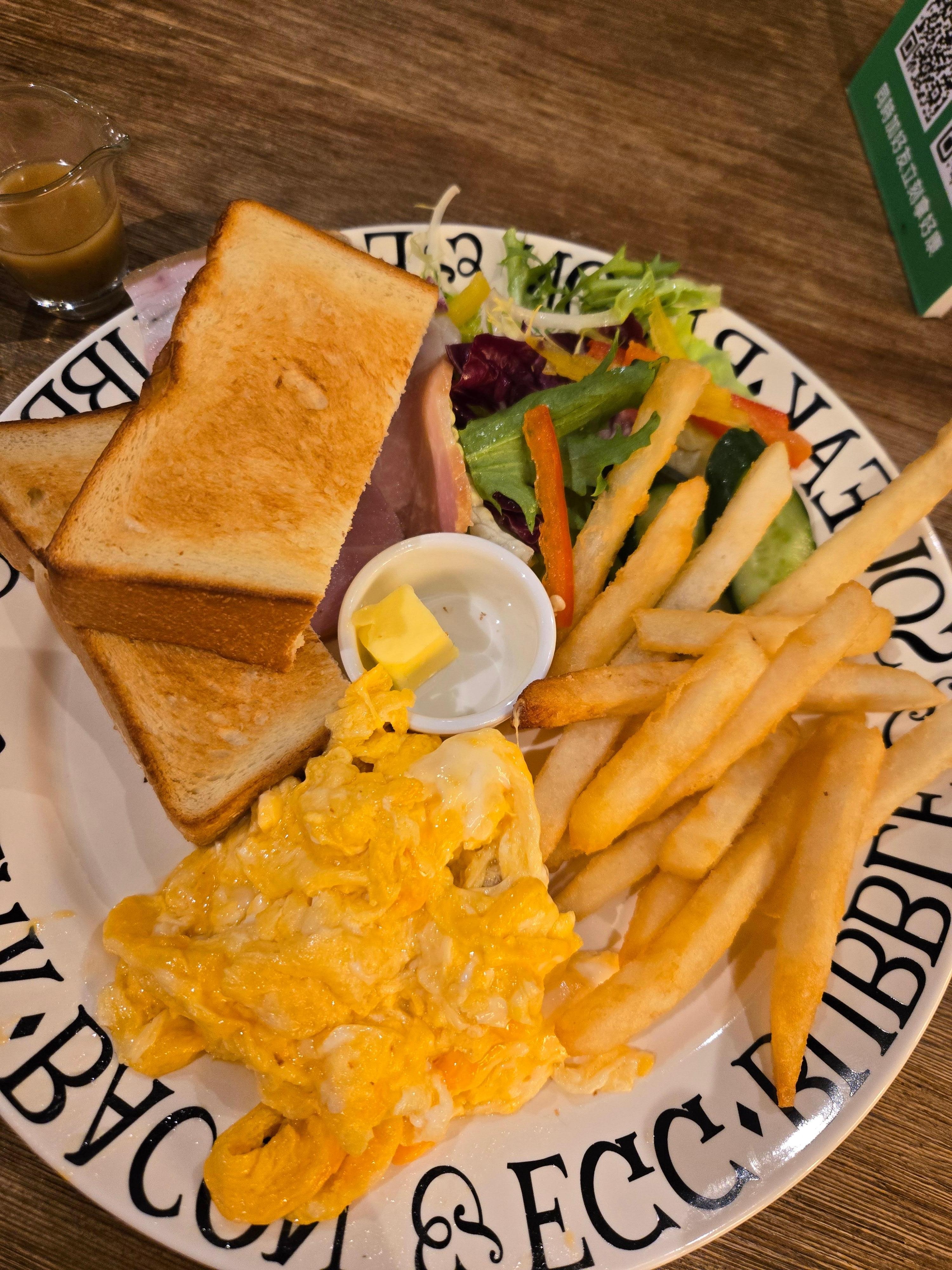 Standard set breakfast with free flow drinks bar - water, coffee, tea and orange juice.