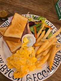 Standard set breakfast with free flow drinks bar - water, coffee, tea and orange juice.
