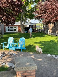 Great backyard has shade if needed fire pit, barbecue and plenty of seating