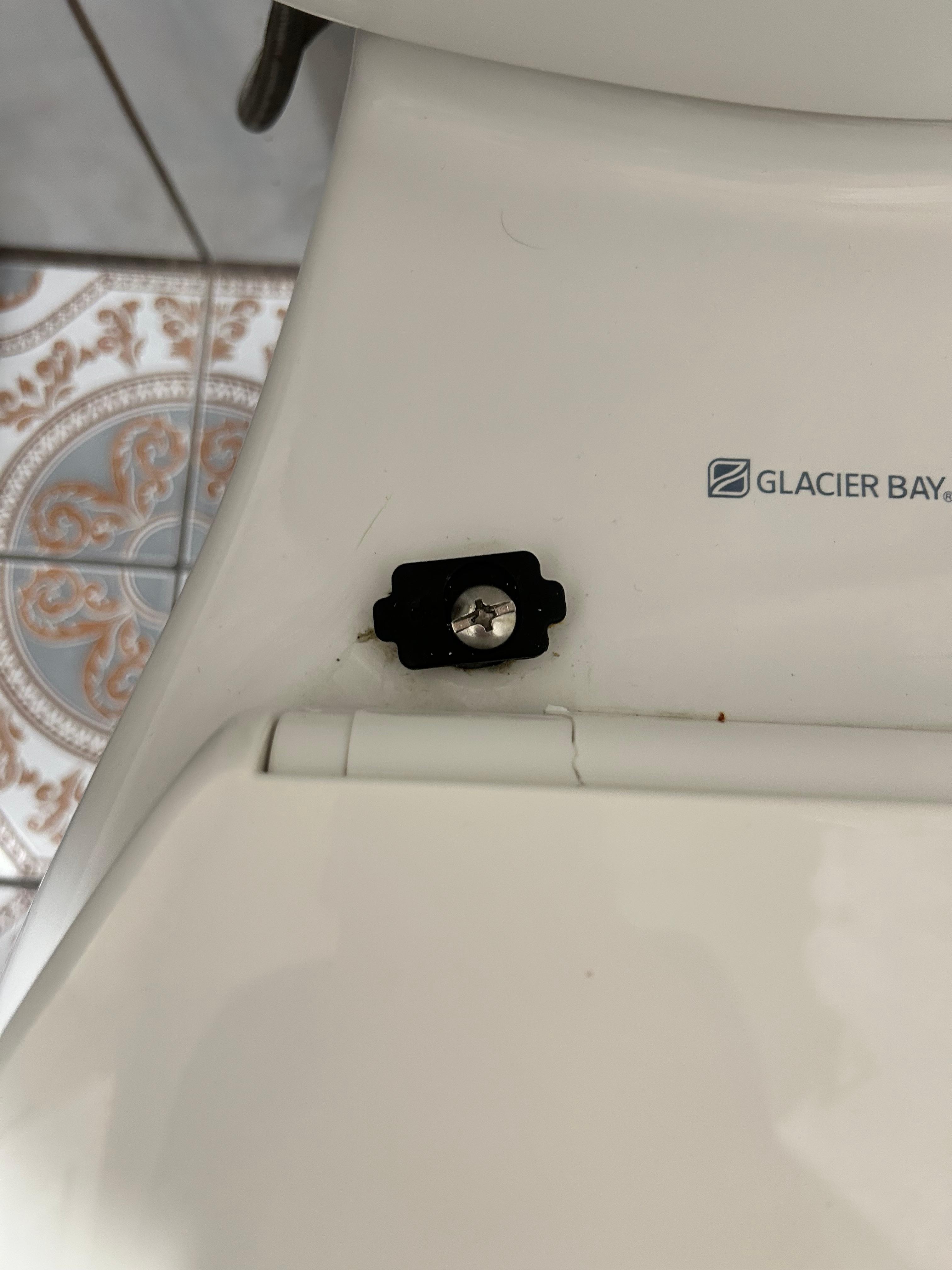Broken toilet screw, lid/seat kept moving