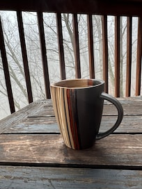 Morning coffee on the deck up in the trees and fog. Very relaxing!