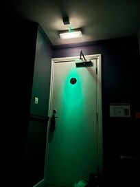 The room with all lights off. The light over the door was ridiculous.