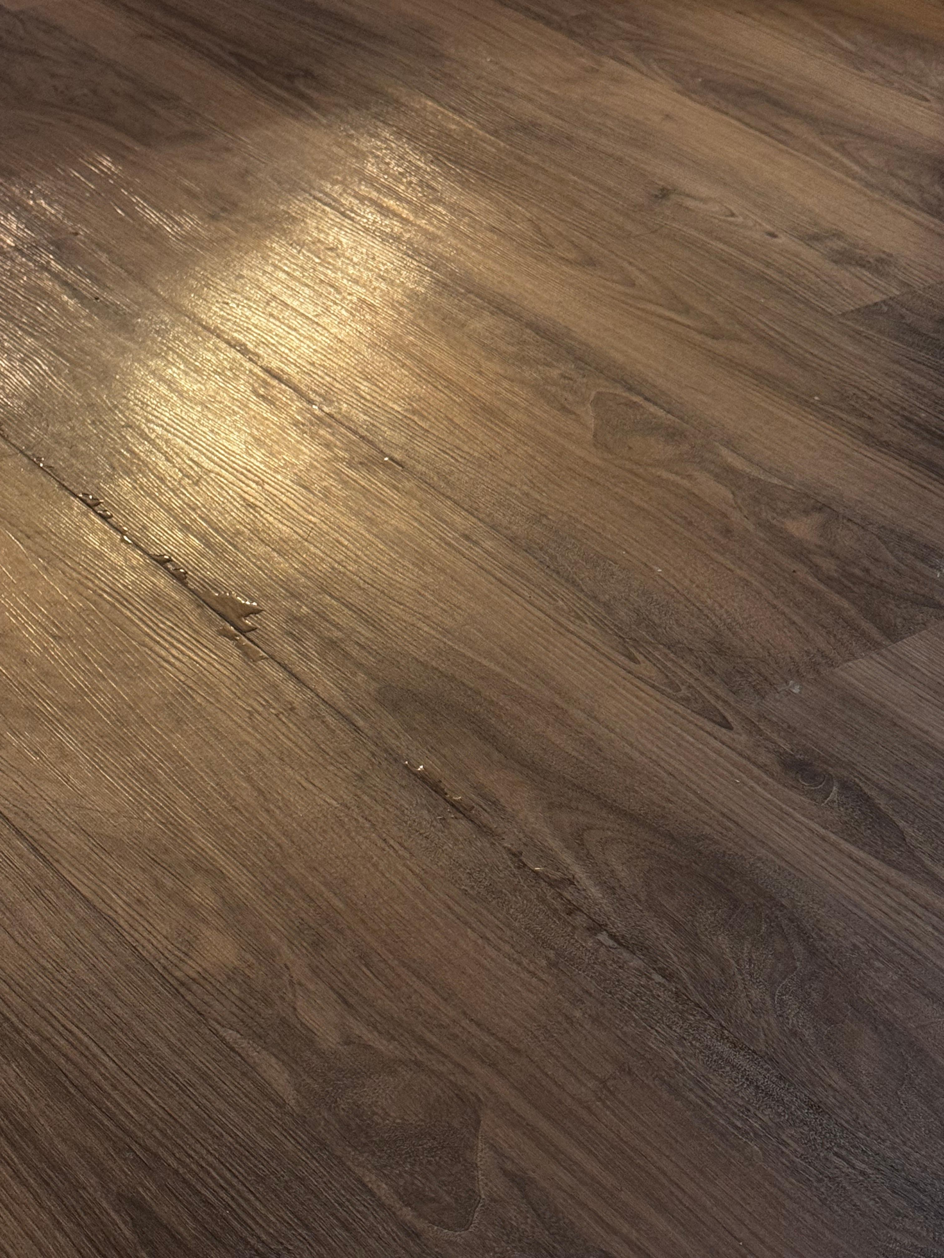 Water coming through the floor while the jacuzzi was filling 