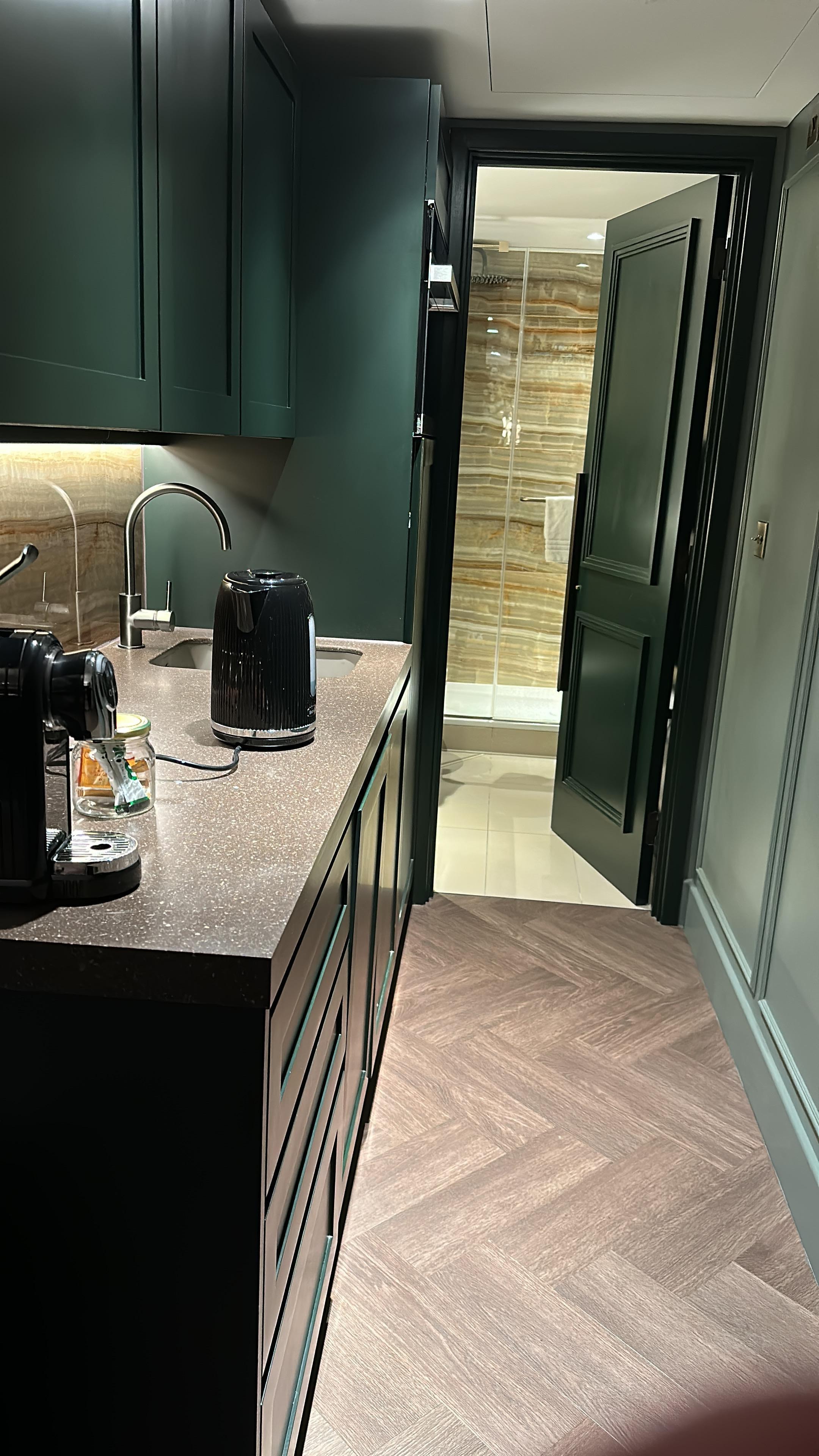 Long thin kitchenette to bathroom