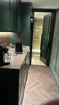 Long thin kitchenette to bathroom