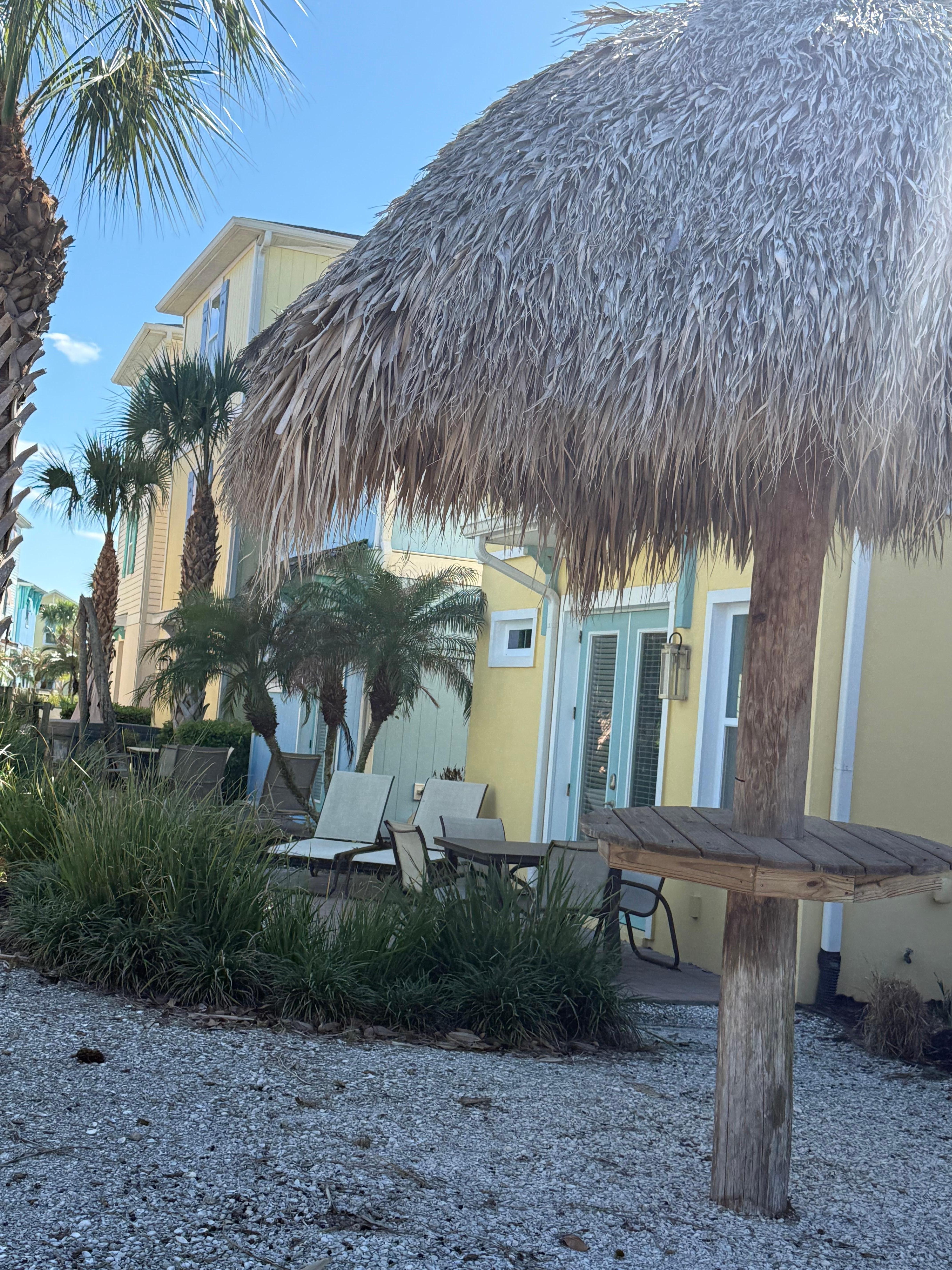 Sandy pathways connect many backyards. 