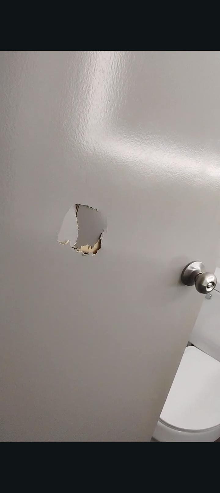 Hole on bathroom door