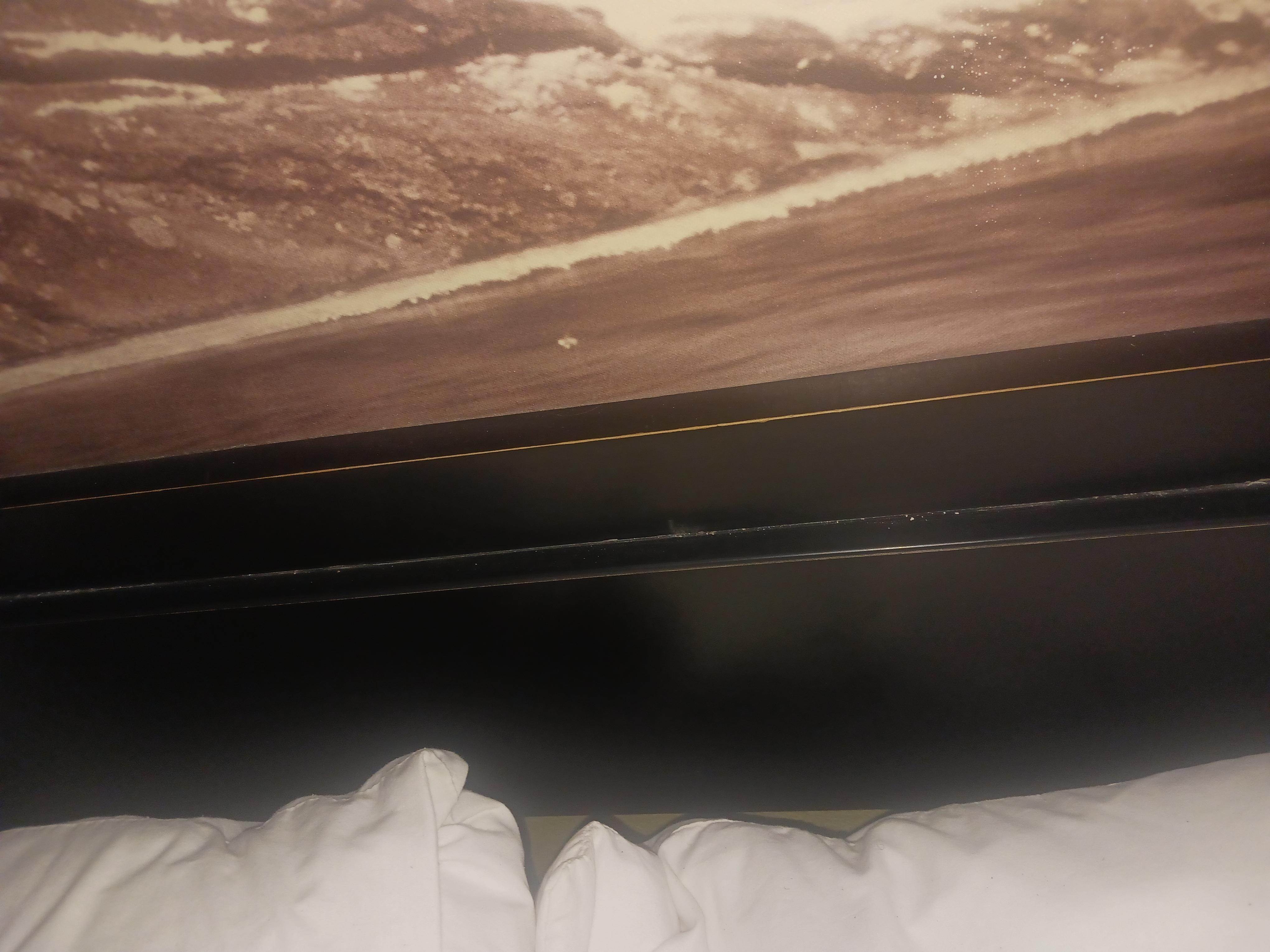 Head board, self were microwave and fridge set on has dust you can write your name in it 