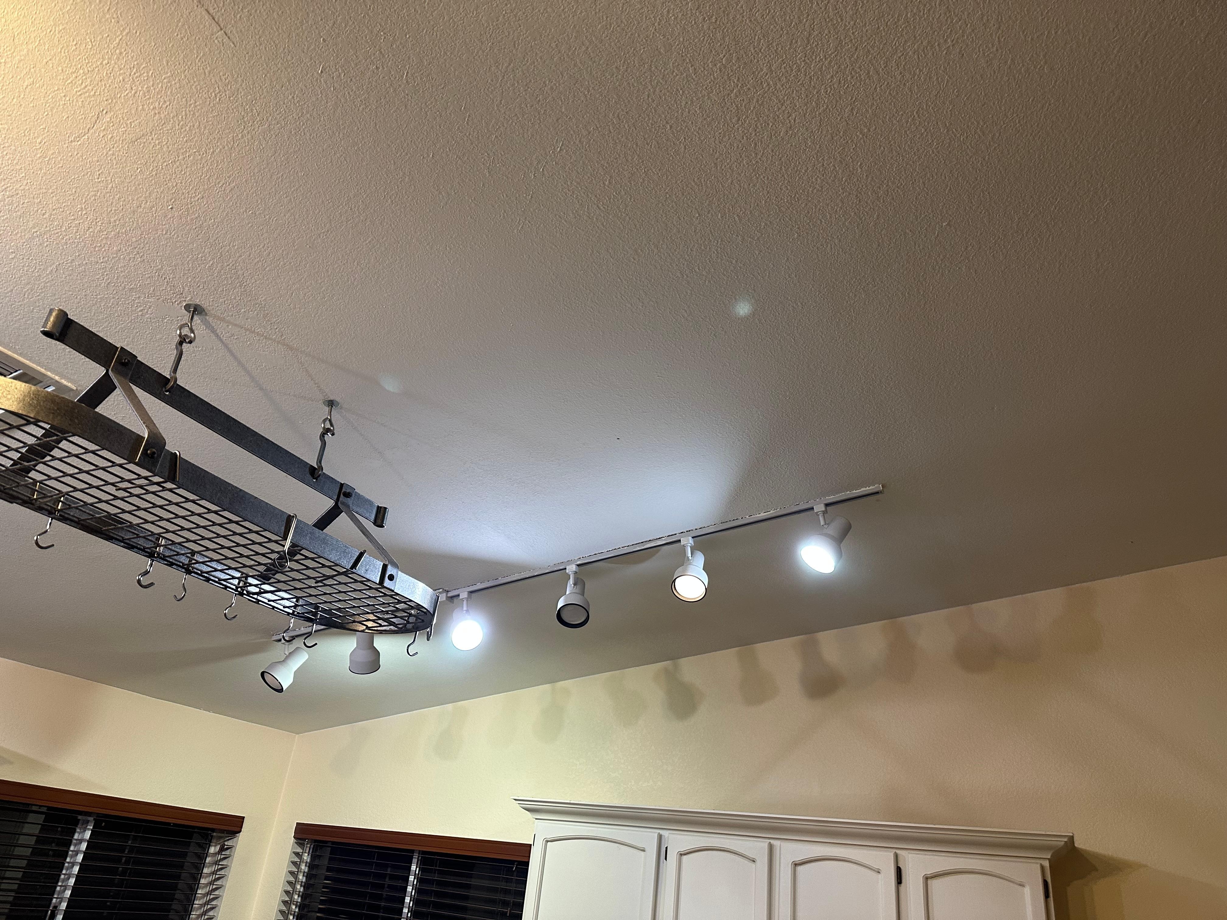 Burned out and mismatched lightbulbs in kitchen