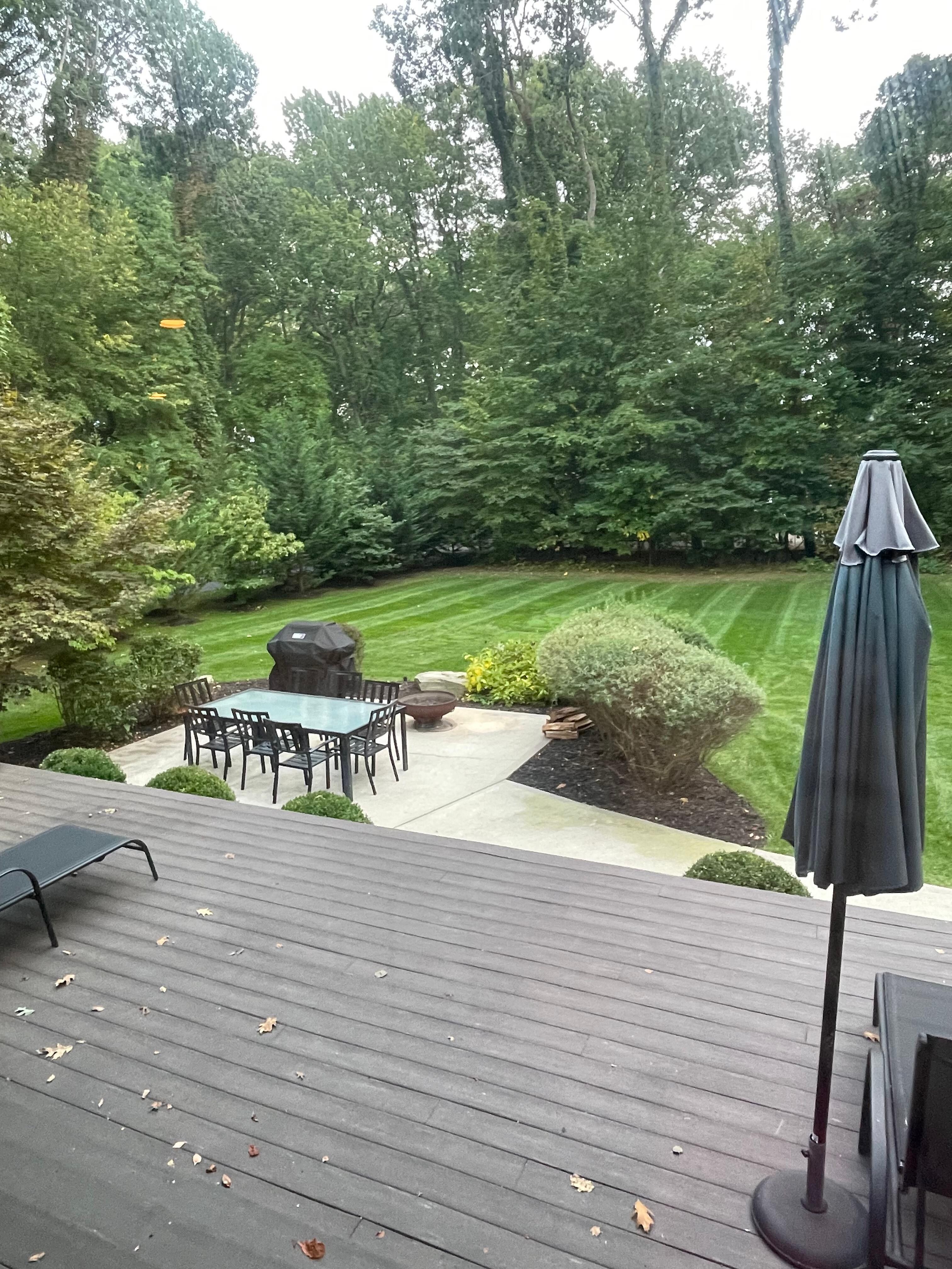 Back yard complete with hot tub and 2 decks