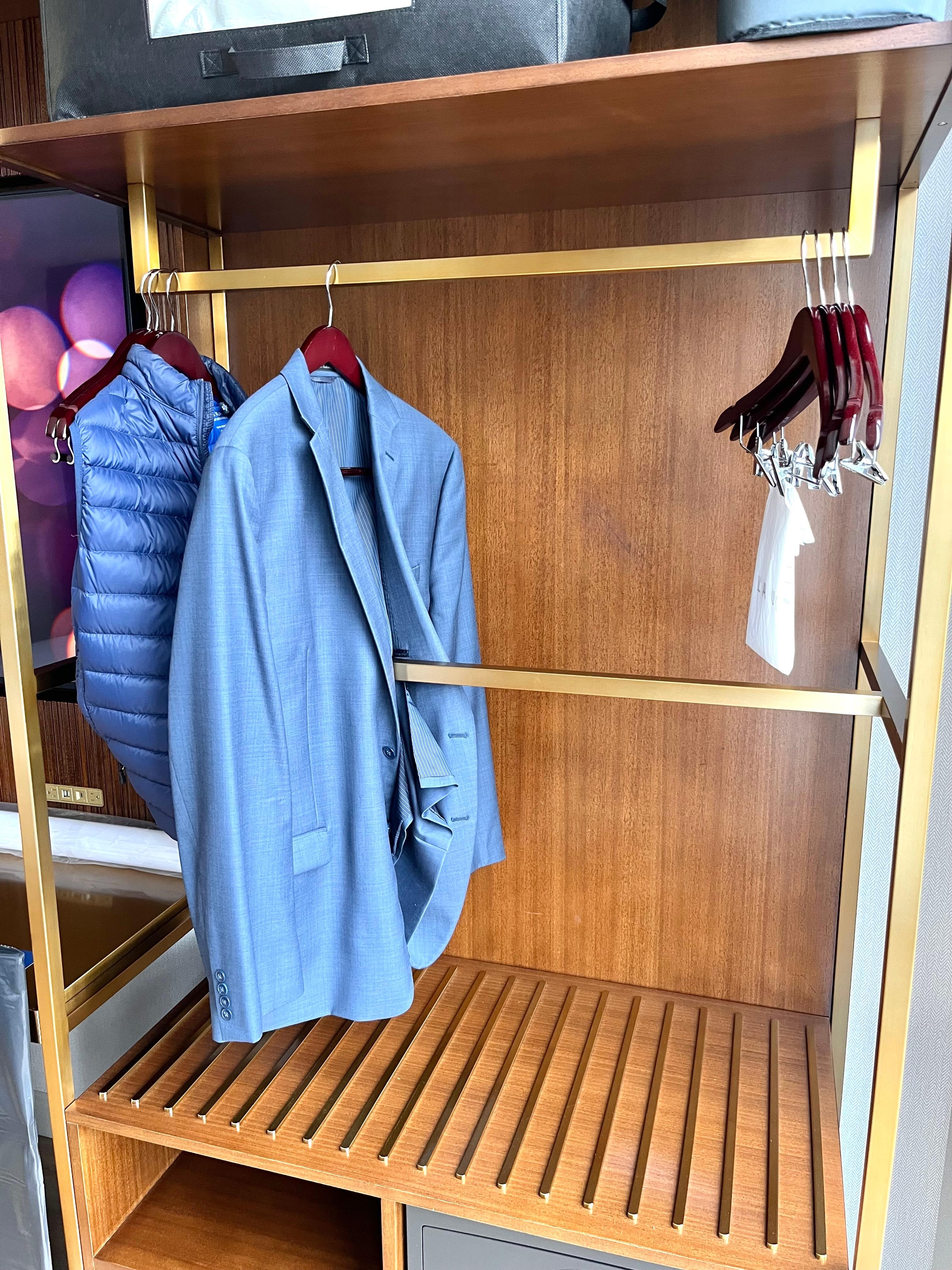 The only place to hang clothes has a metal bar through the middle — wrinkling anything that hangs there. 