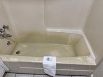 Possibly just coating coming off but we decided not to bathe/shower here