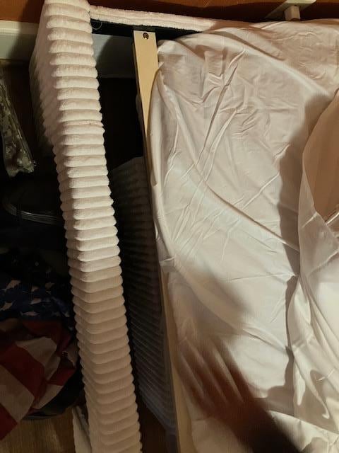 bed mattress falling off supporting structure at foot