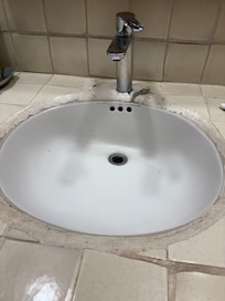 Broken tiles in the sink