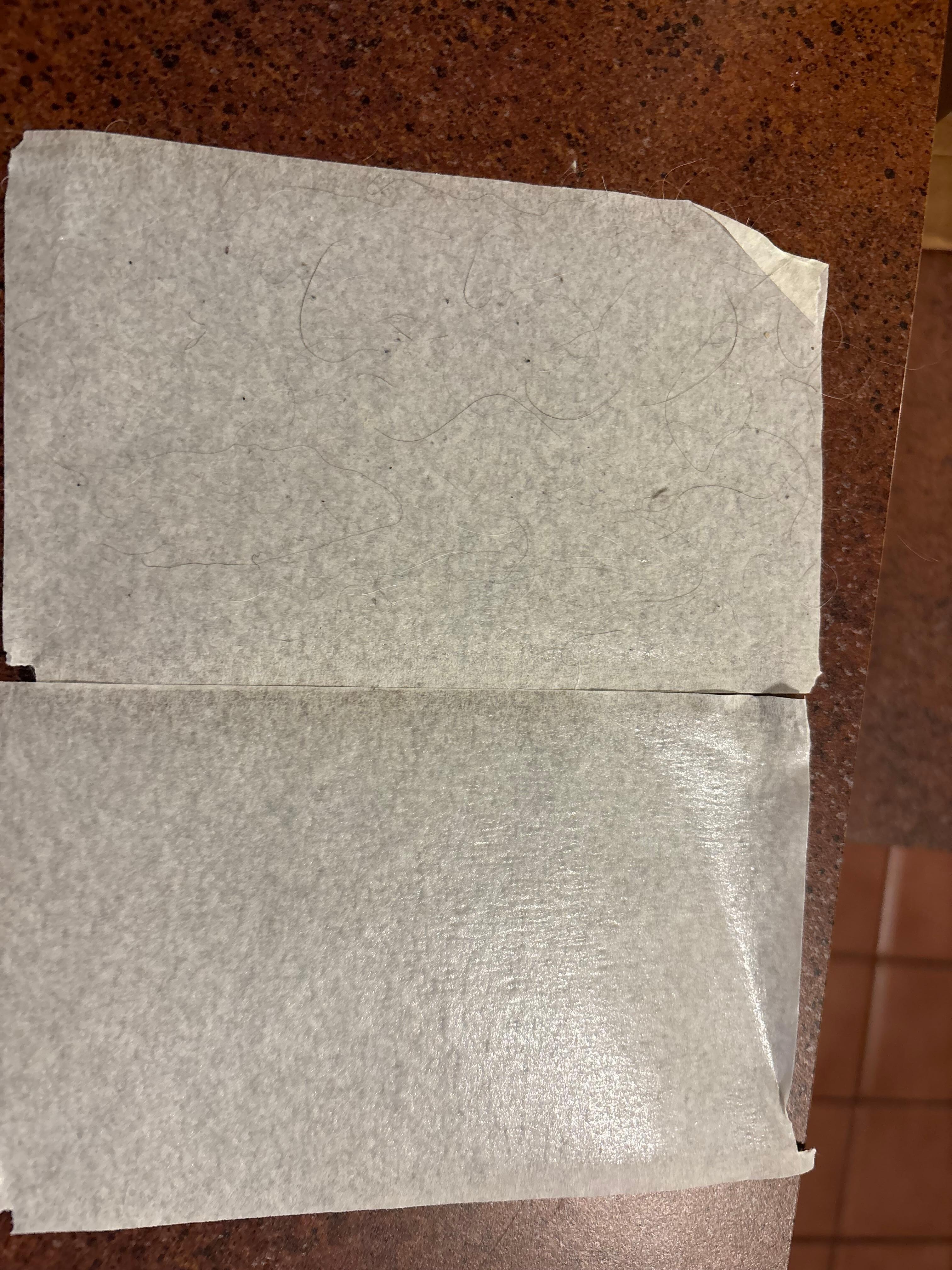Top is what was on the sheets. Dog hair and brown ?? Below is  a clean sticky 