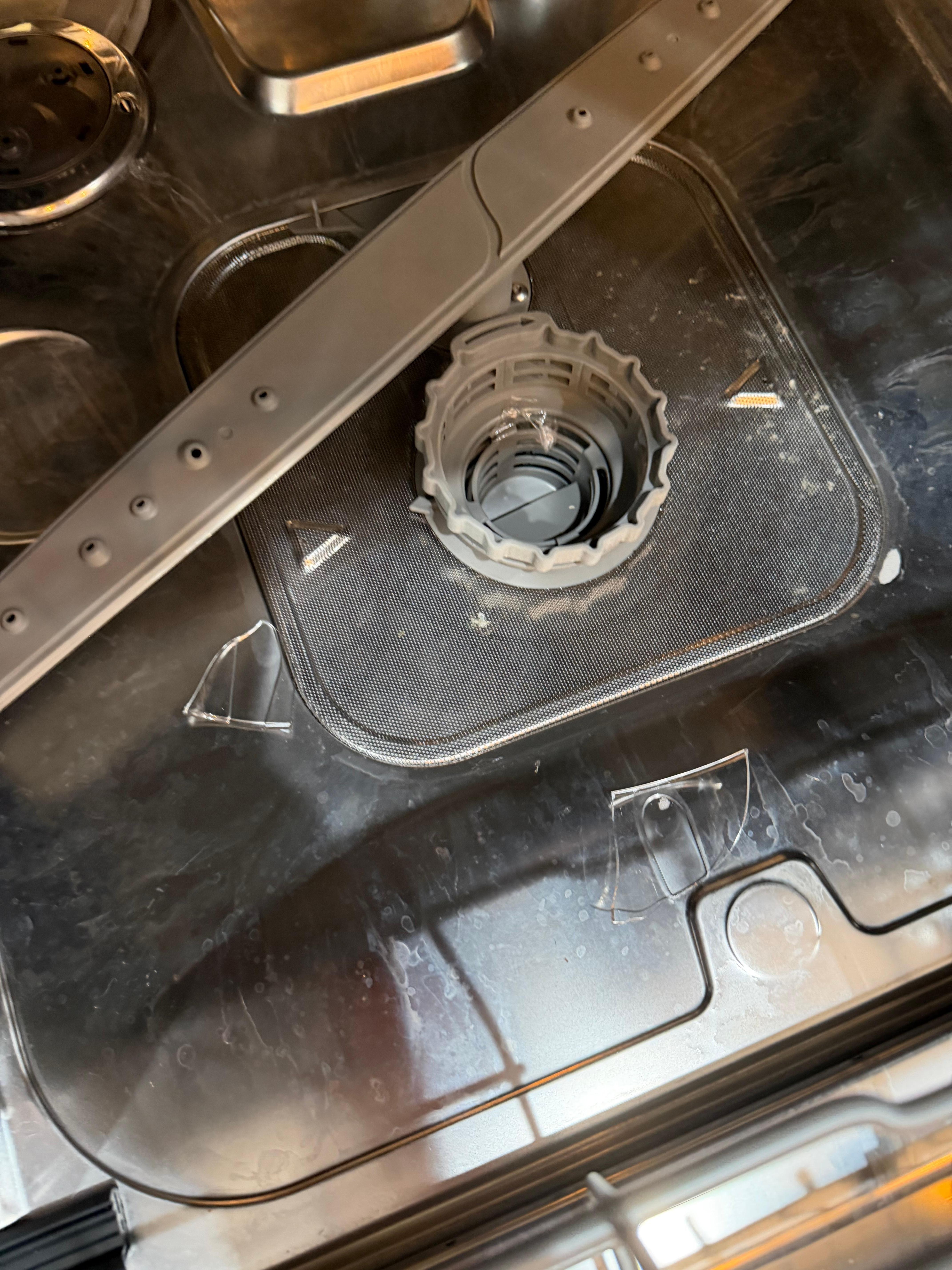 Broken glass in dishwasher from prior guest or housekeeping