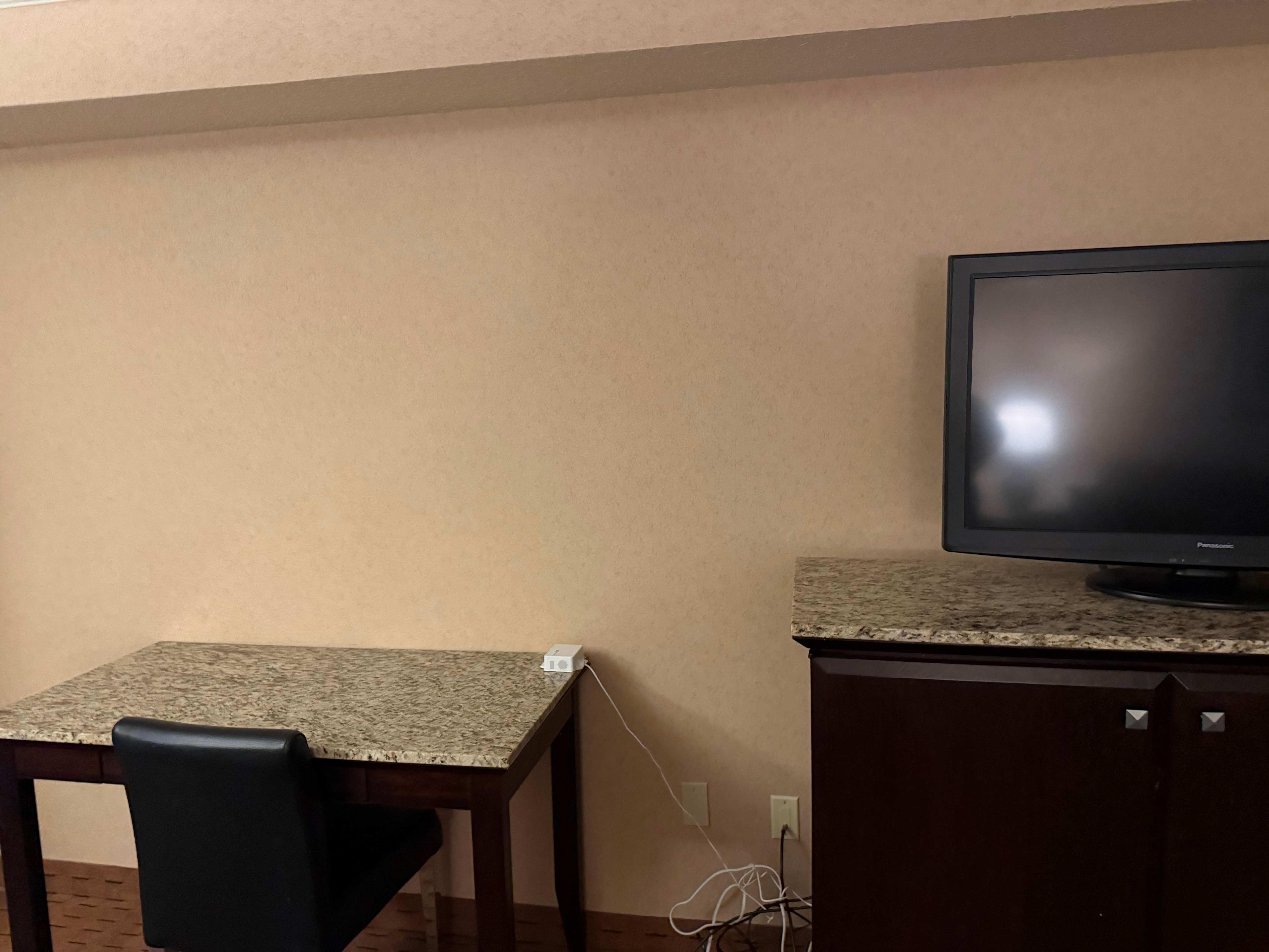 Blank walls small tv  for a big room