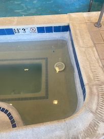 Light fixture fell in hot tub