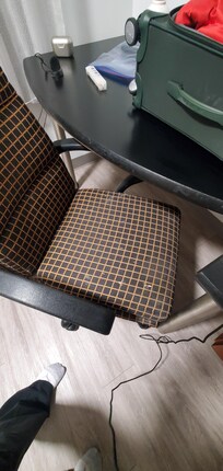 Chair in room. Too stained to sit on