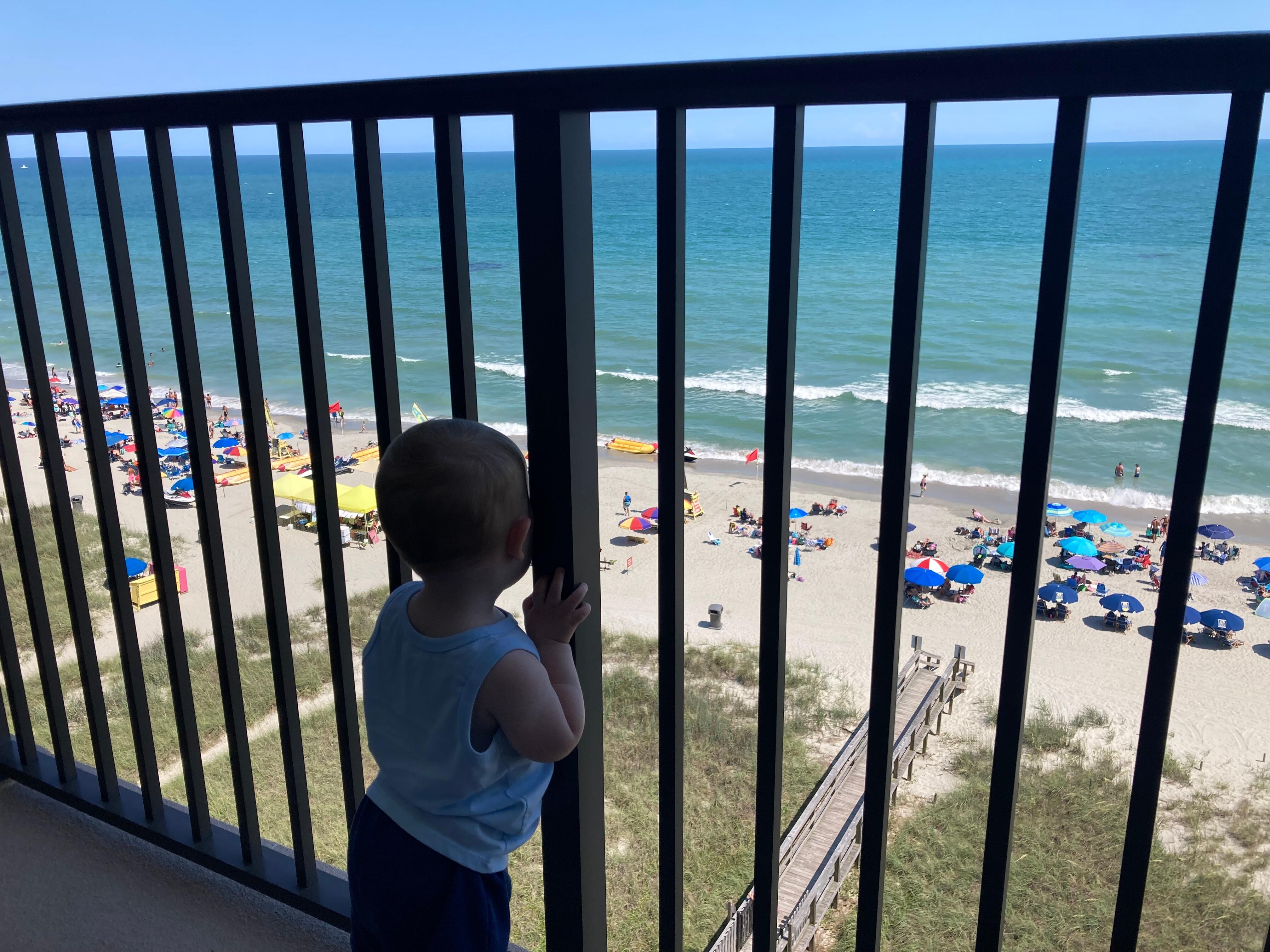Baby on balcony (it was very safe and we were very careful!)