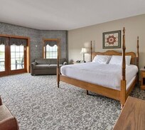 Room with King size bed.