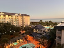 Dusk, you see the pool near the ocean, HEATED 🤩💯❤️