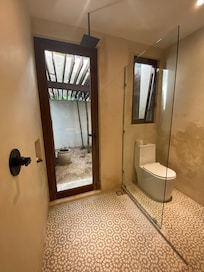 This was after the shower head was replaced, however you had to shower right next to the glass door that lead out to the garden