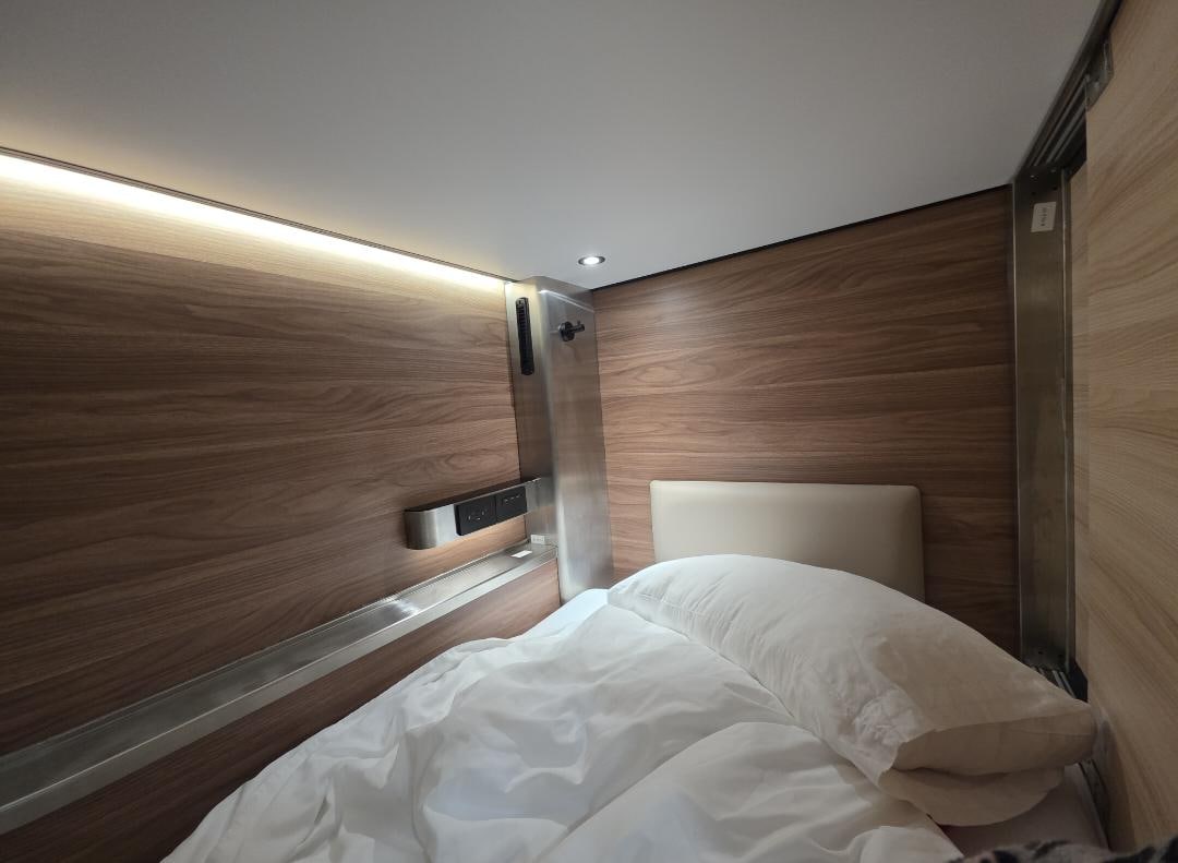 Outlets, capsule lights and shelf - super convenient!!  Best in all hostels I've stayed at!